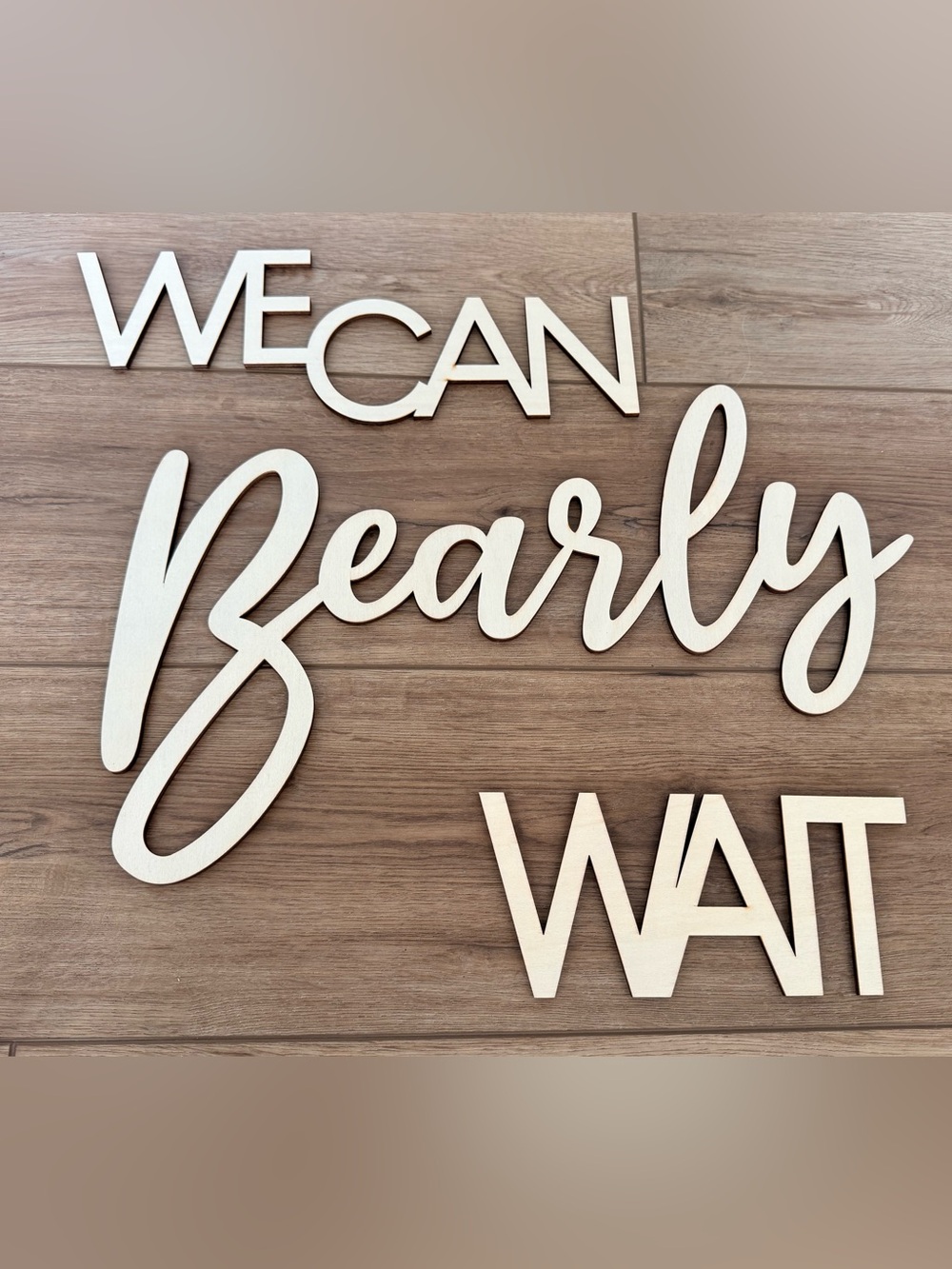 Baby shower decor “We Can Bearly Wait' Wall Art in light wood